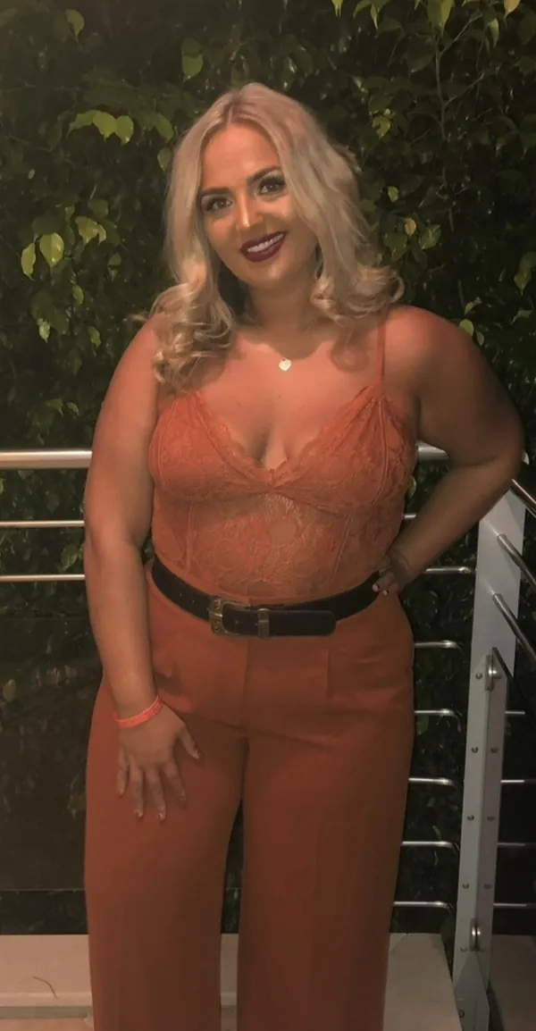 Adrienne before, dressed up for a night out